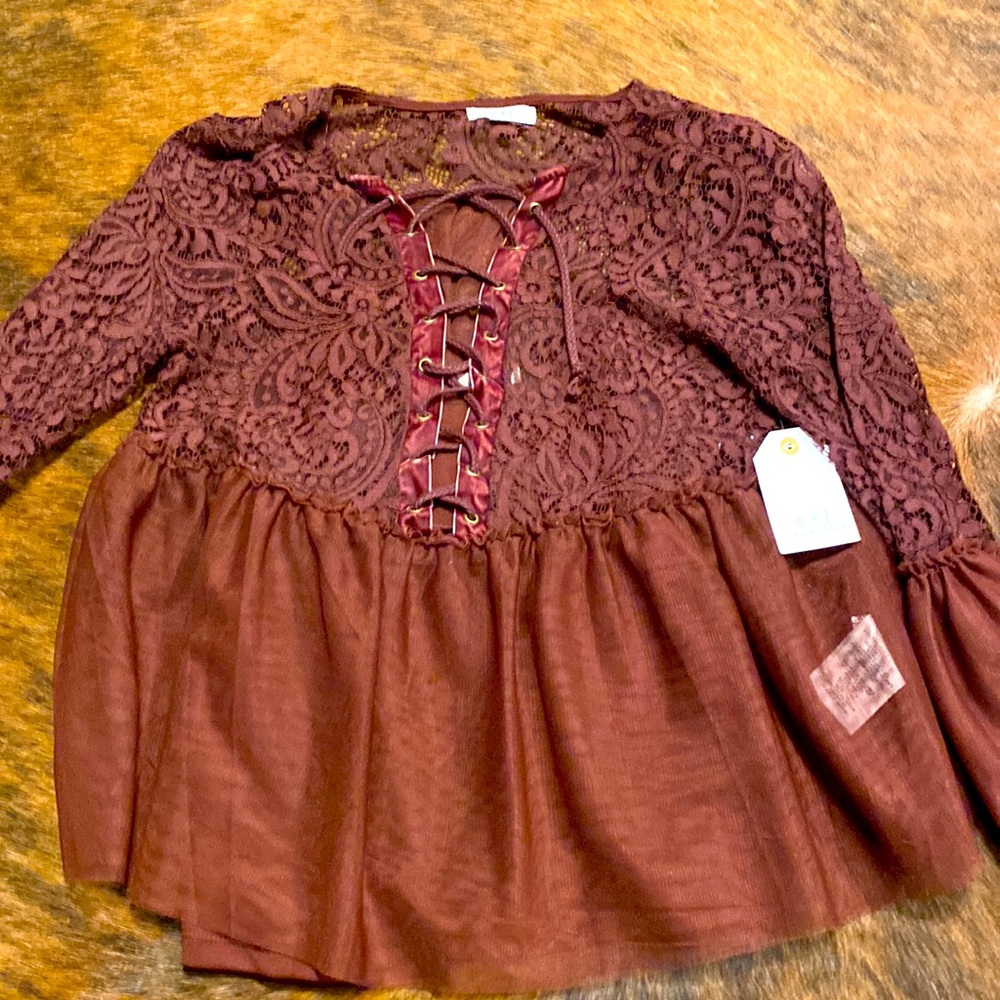 Dark berry top new with tags on it